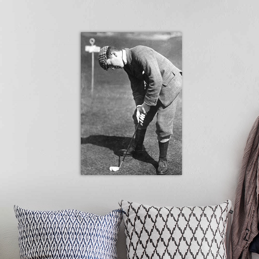 A bohemian room featuring circa 1910:  The golfer Bryce during play