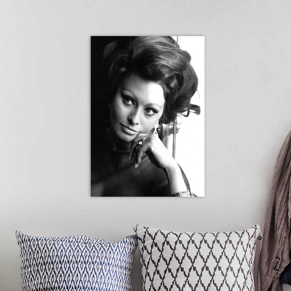 A bohemian room featuring Italian film actress, Sophia Loren at a photocall