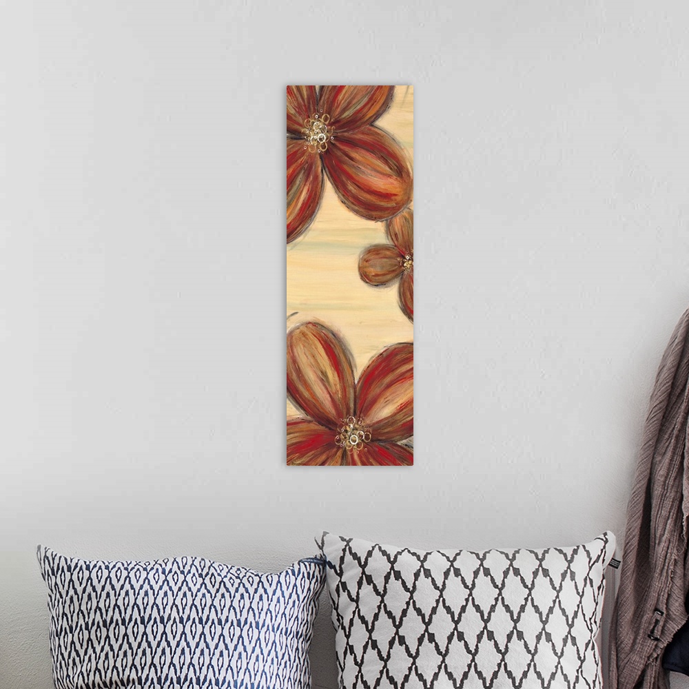 A bohemian room featuring Contemporary home decor artwork of warm toned flowers against a neutral background.