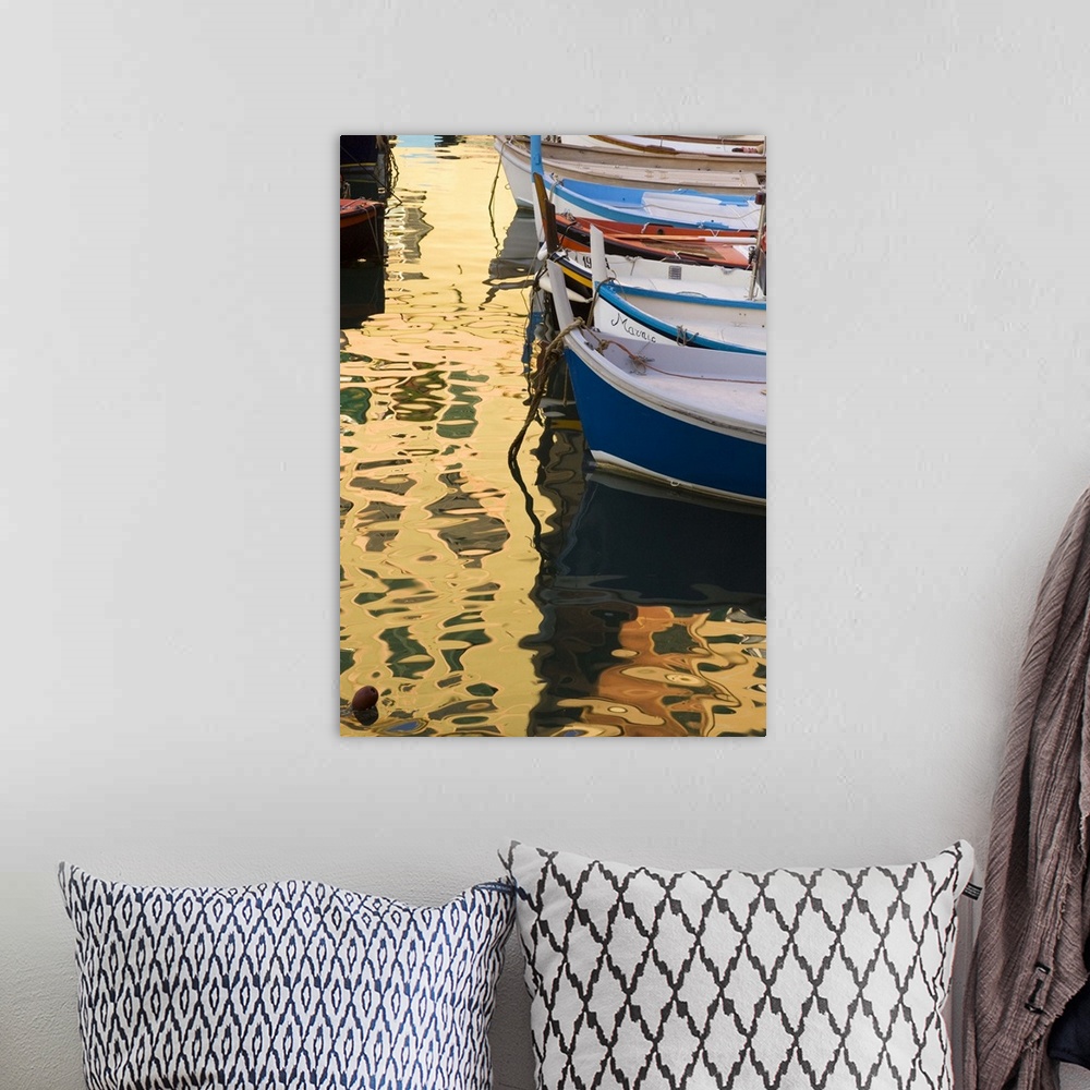 A bohemian room featuring Europe, Italy, Camogli. Boats and buildings form abstract reflections on water.