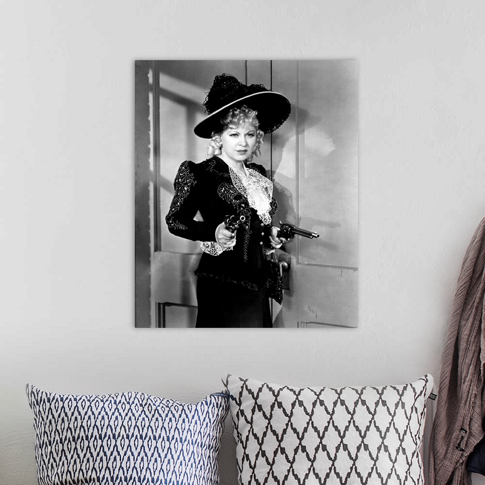 A bohemian room featuring MY LITTLE CHICKADEE, Mae West, 1940.
