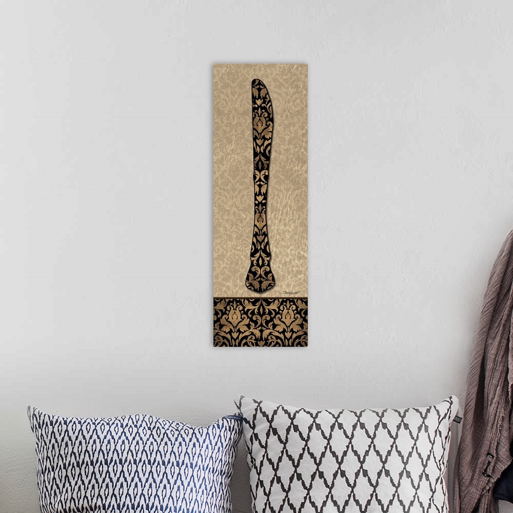 A bohemian room featuring Home decor in brown, black, and gold tones with an illustration of a knife with a paisley design.
