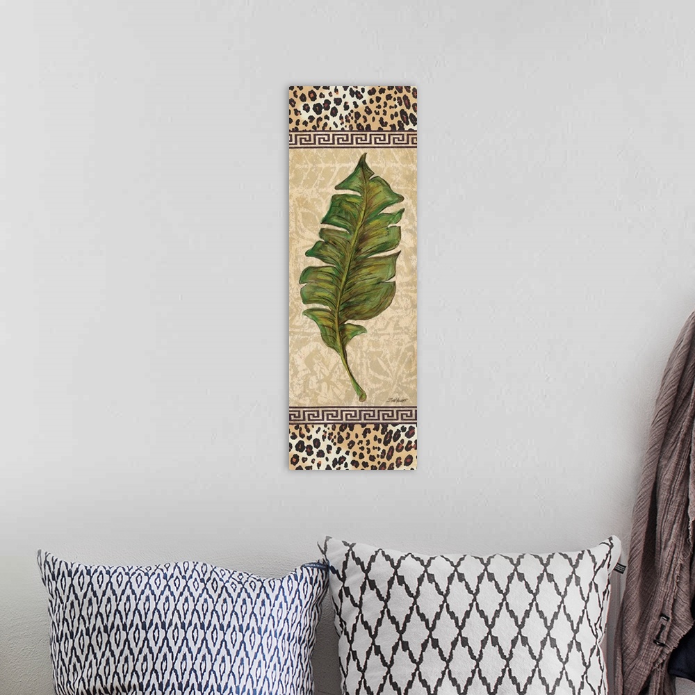 A bohemian room featuring Tropical decor with a palm leaf on a decorative tan background with cheetah print on the top and ...