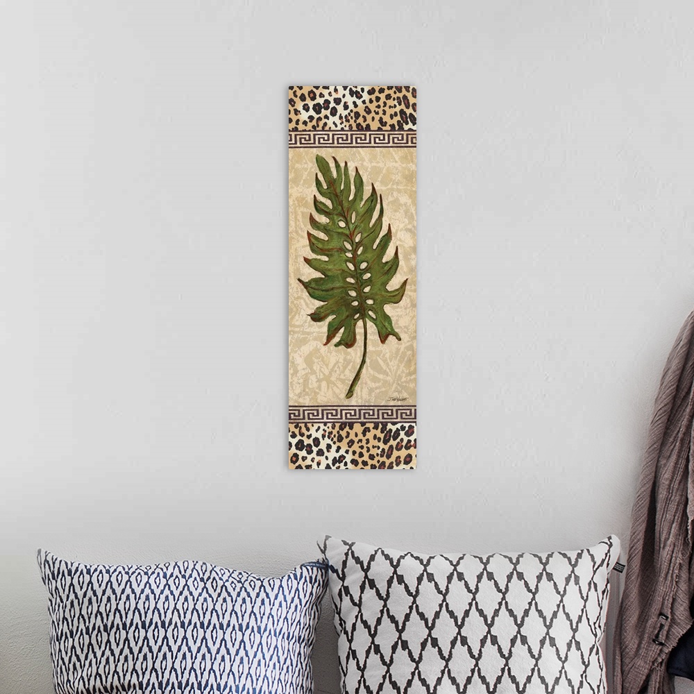 A bohemian room featuring Tropical decor with a palm leaf on a decorative tan background with cheetah print on the top and ...