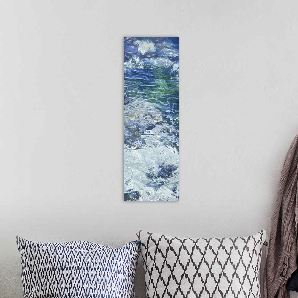 A bohemian room featuring Tall photograph of crystal clear blue water with ripples.