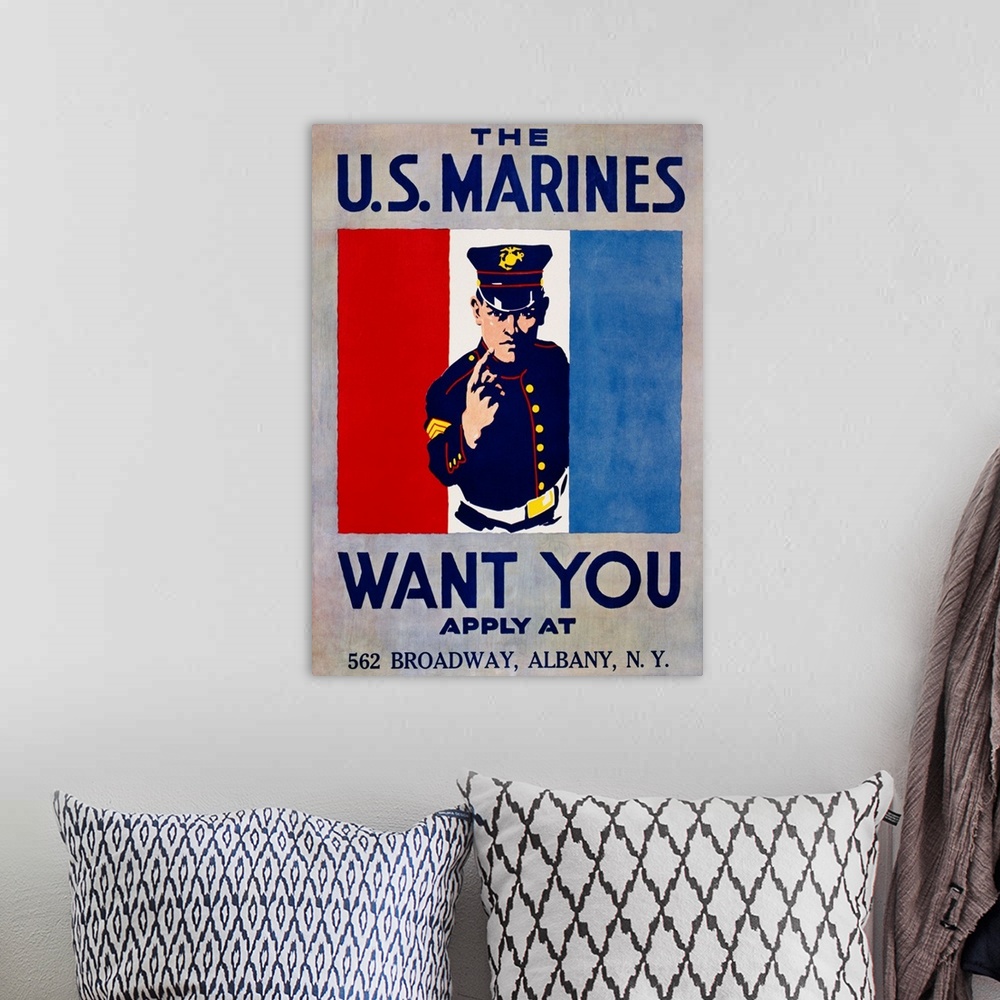 A bohemian room featuring The U.S. Marines Want You Poster