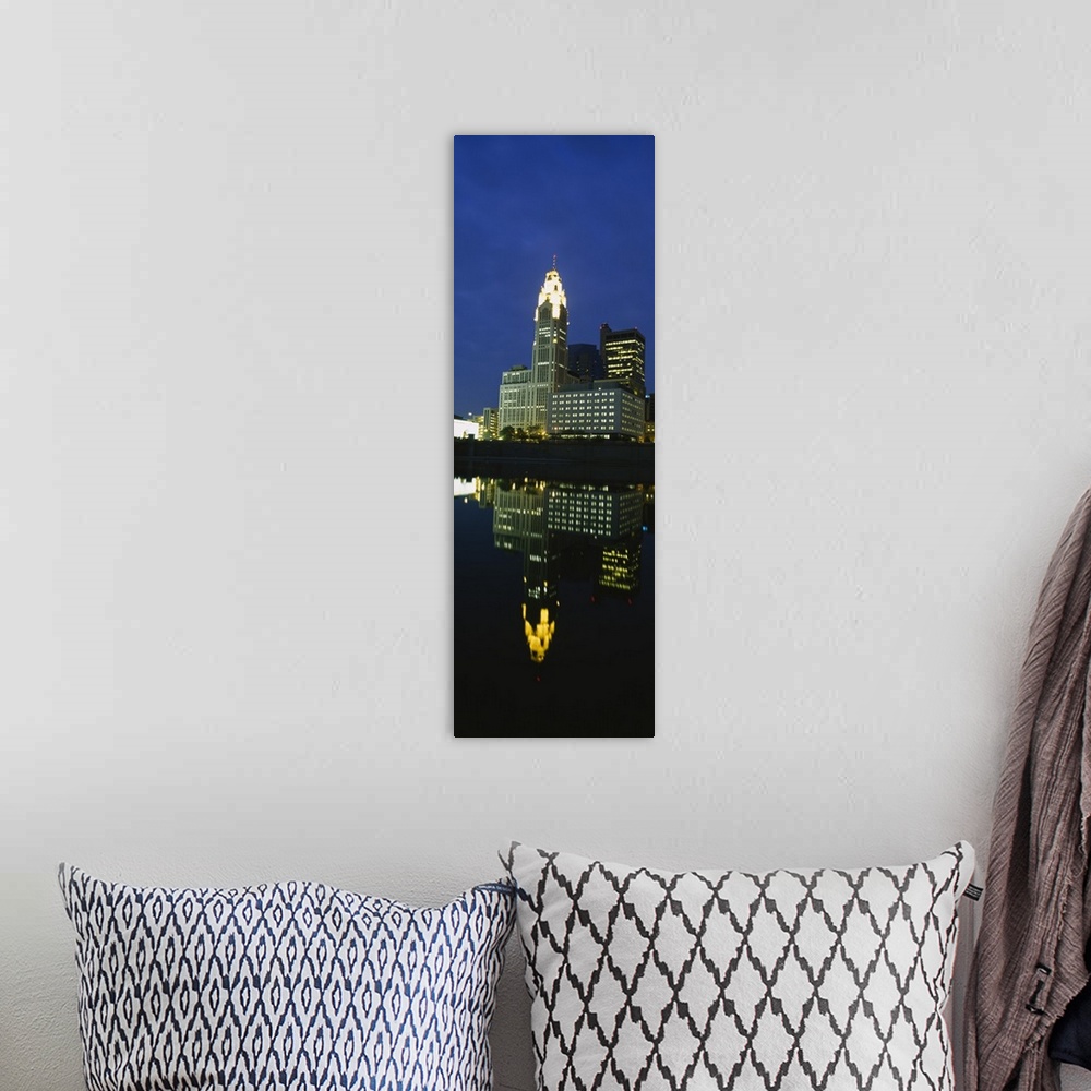 A bohemian room featuring Buildings in a city lit up at night, Scioto River, Columbus, Ohio