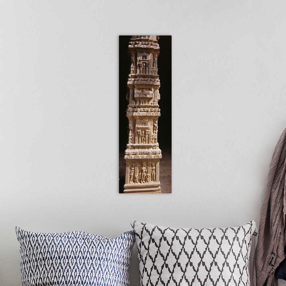 A bohemian room featuring Sculptures carved on a column, Tamil Nadu, India
