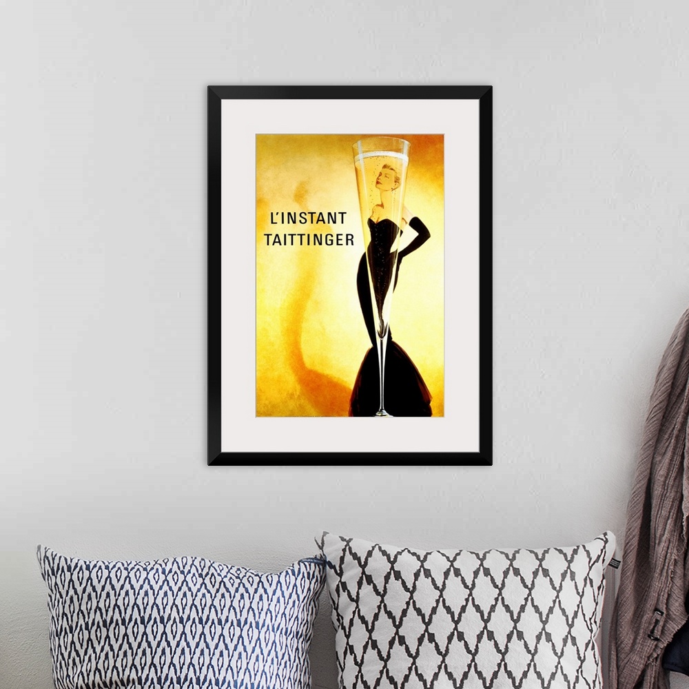 A bohemian room featuring Big print of a slender champagne filled glass with a woman posing seen through it.