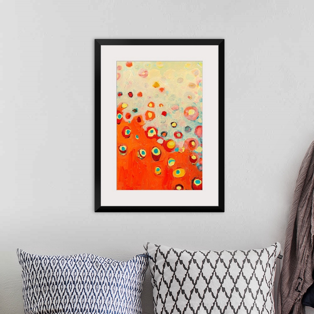 A bohemian room featuring Vertical abstract painting from the Growing in the Valley series of floral images, with circular ...