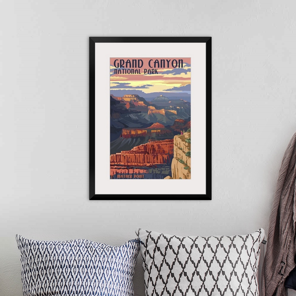 A bohemian room featuring Retro stylized art poster of a view of a massive canyon.
