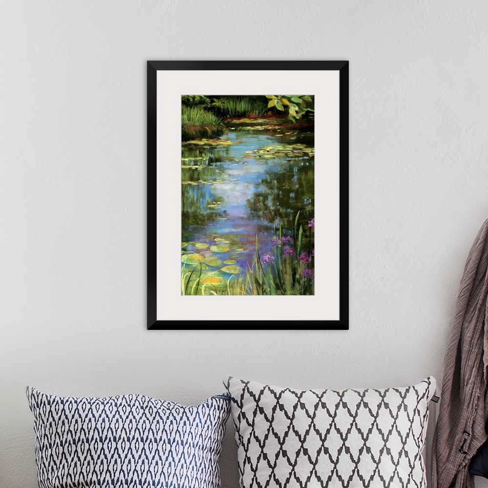 A bohemian room featuring Big vertical painting of a garden water scene with flowers, water lillies, grasses, trees and oth...