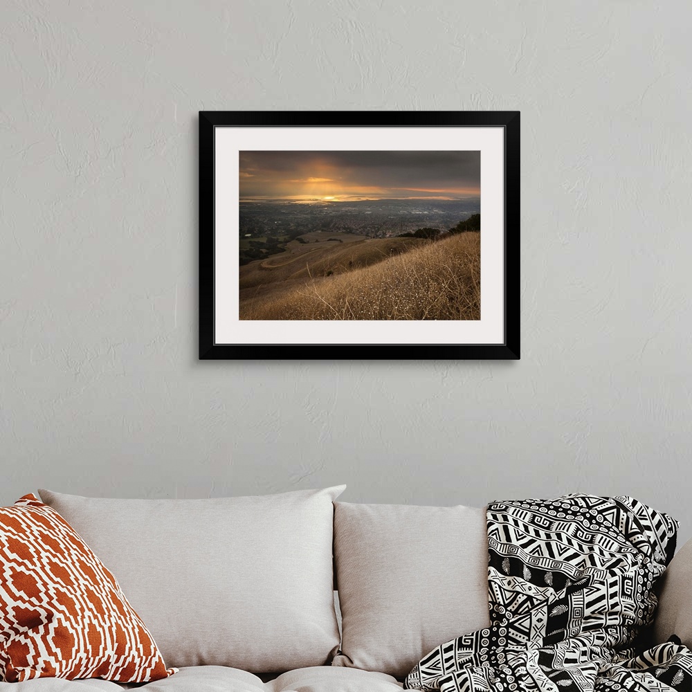 A bohemian room featuring San Francisco Bay under golden sunset from Mission Peak, Fremont, California.