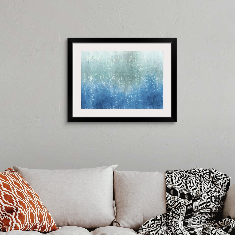 A bohemian room featuring Contemporary abstract painting using tones of blue in cascading and gradating movements.