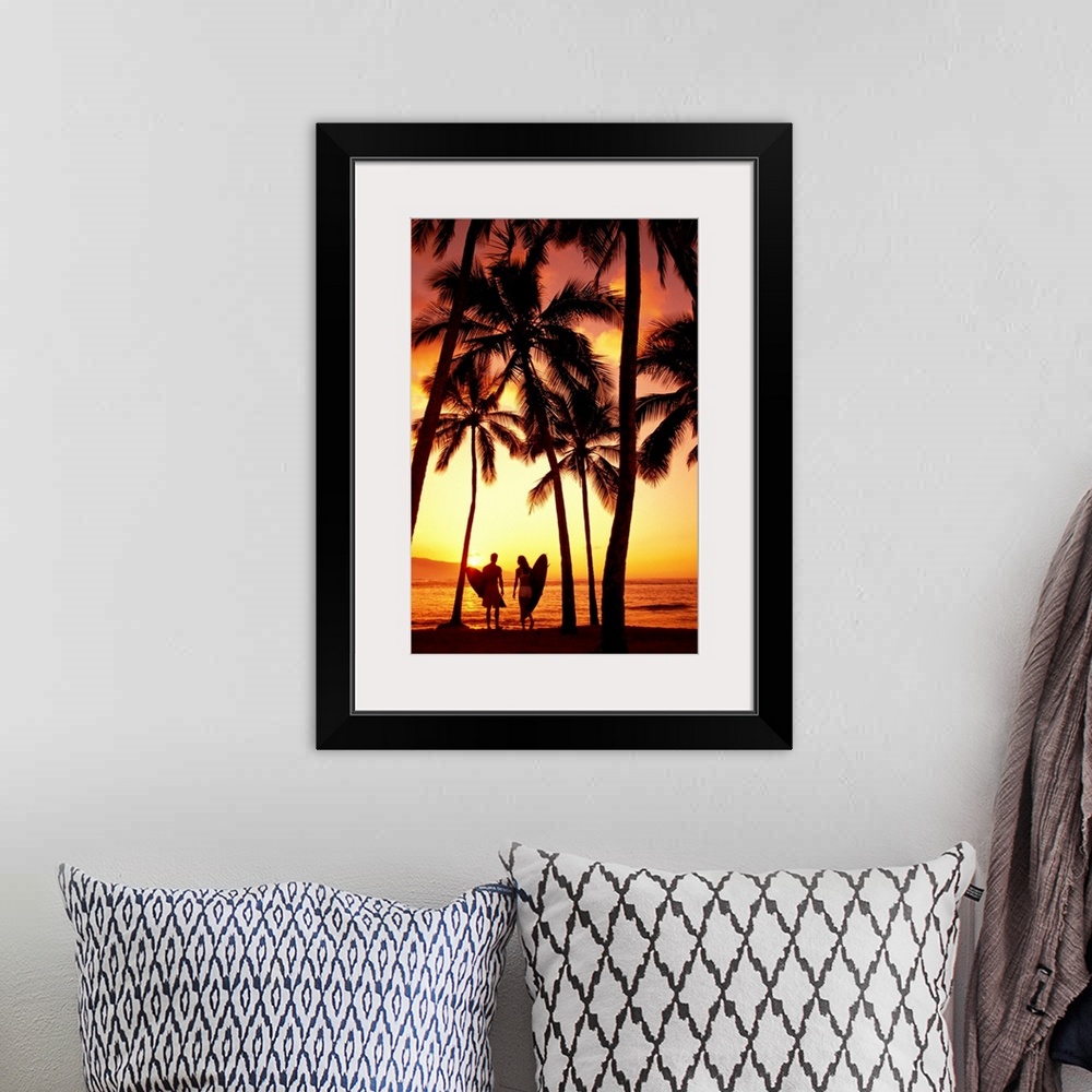 A bohemian room featuring Hawaii, Oahu, North Shore, Couple Walk Under Palms With Surfboards At Sunset