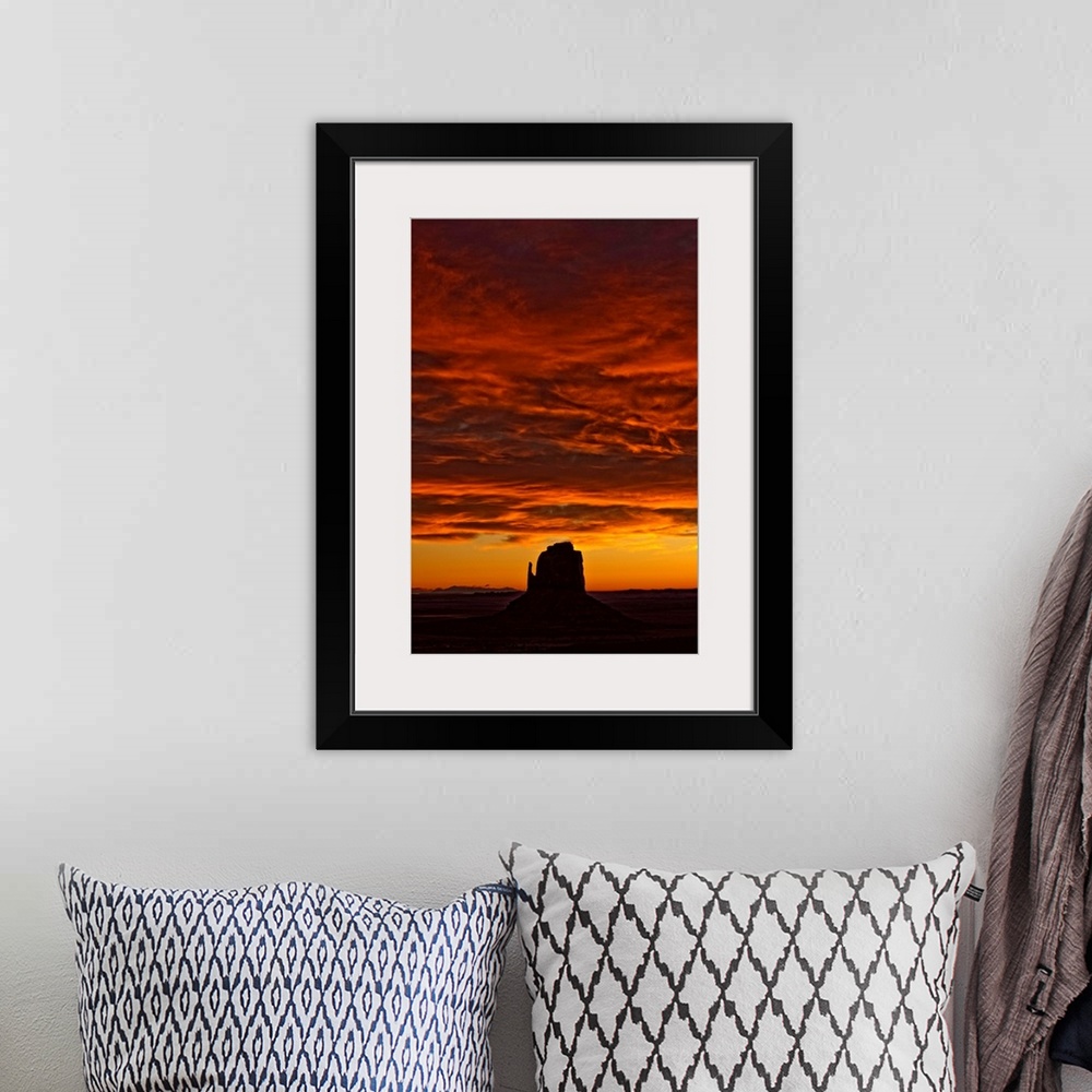 A bohemian room featuring Sunrise Over Monument Valley, Arizona, USA