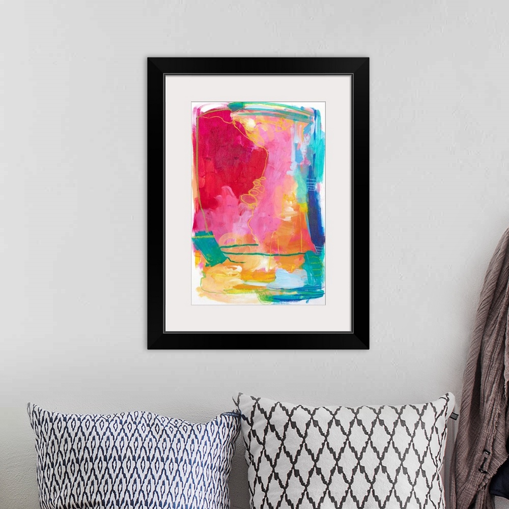 A bohemian room featuring Contemporary abstract artwork in bright red, pink, and teal shades.