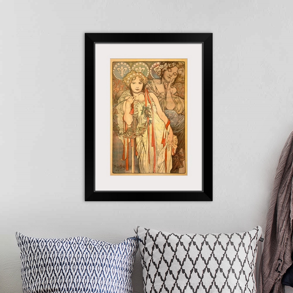 A bohemian room featuring Large, vertical vintage poster art of two women in flowing dresses with elaborate hair pieces.  T...