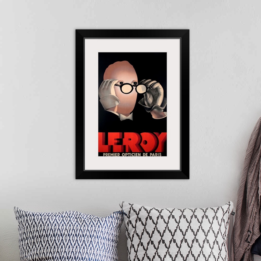 A bohemian room featuring Vintage poster advertisement for Leroy Optical.