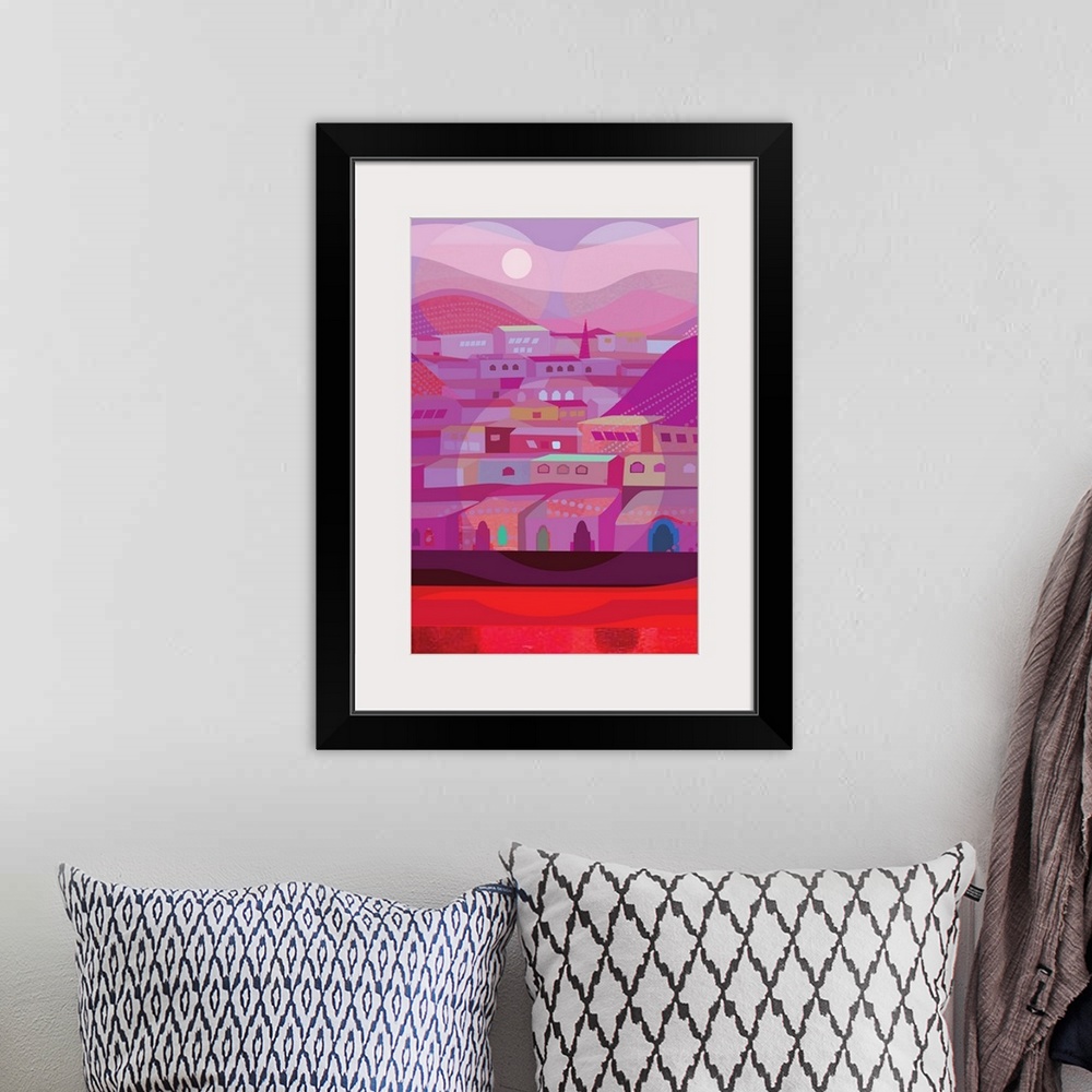 A bohemian room featuring A vertical illustration of houses near mountains, in various shades of pink with light circular a...