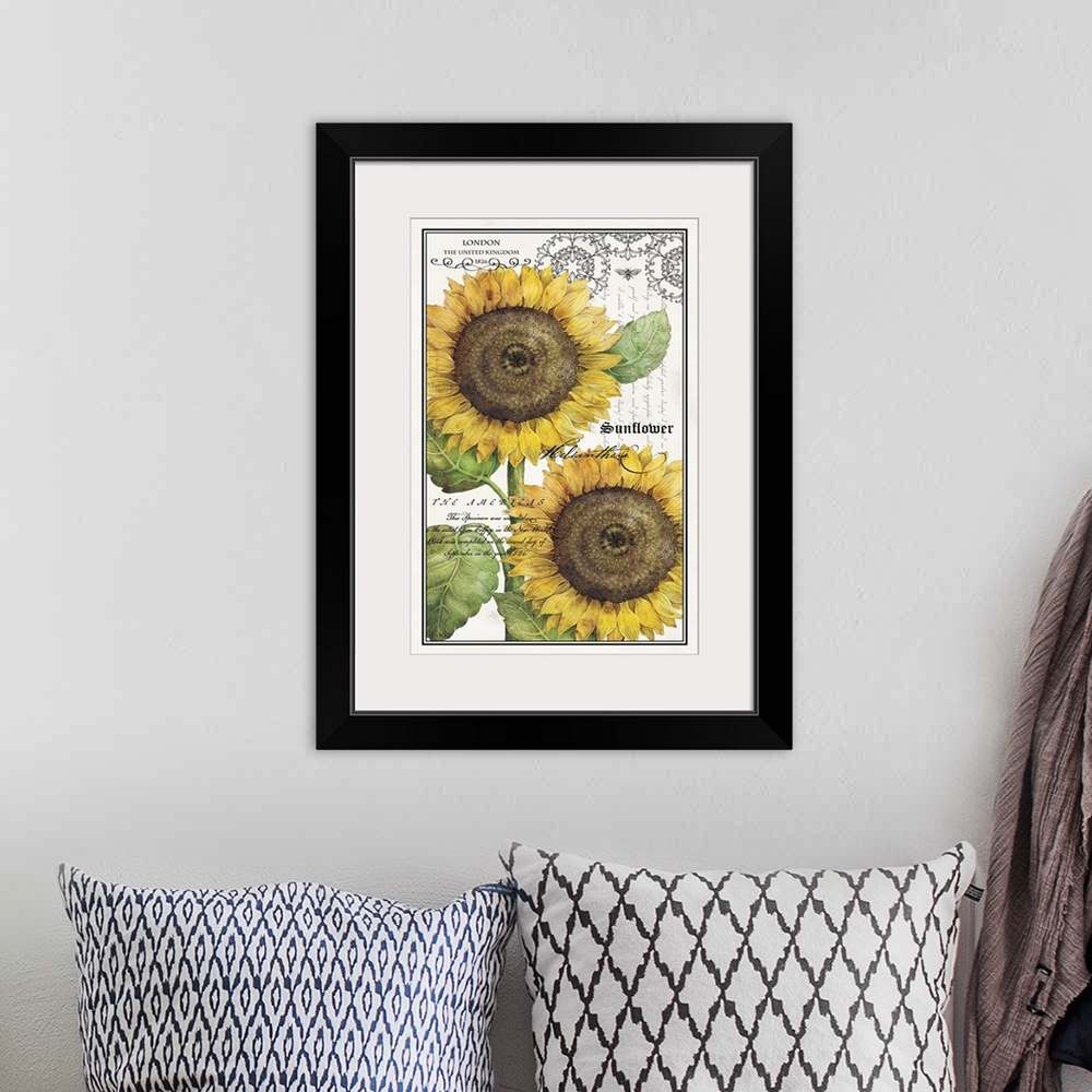 A bohemian room featuring Antique style home docor art of two bright yellow sunflowers with fancy script text and an outlin...
