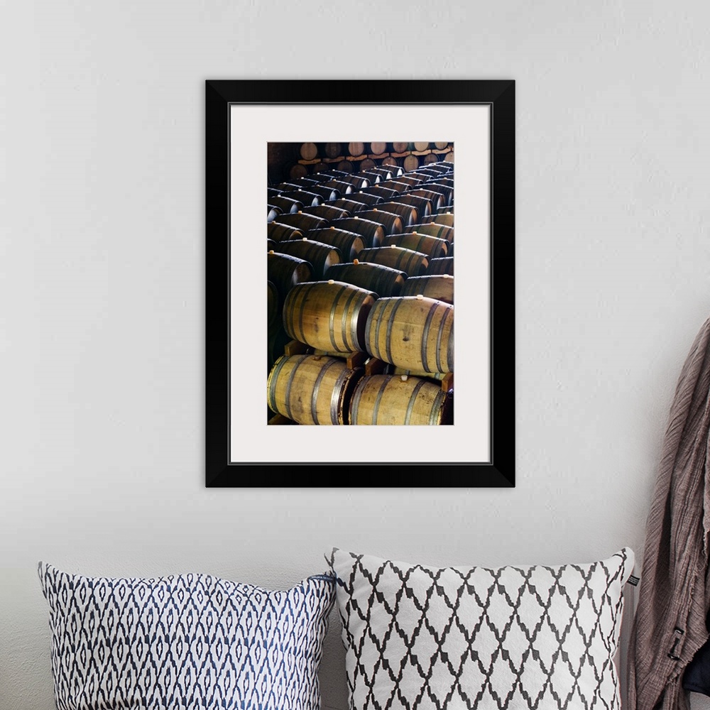 A bohemian room featuring Italy, Lombardy, Barriques in a cellar of Bellavista Wine Estate
