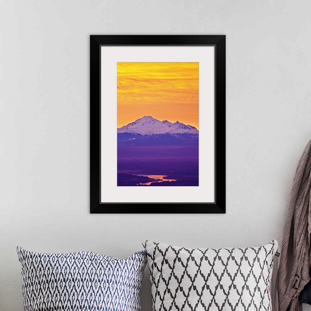 A bohemian room featuring Famous Mt.Baker volcano, located in  North Cascade Mountain Range dominates background while earl...