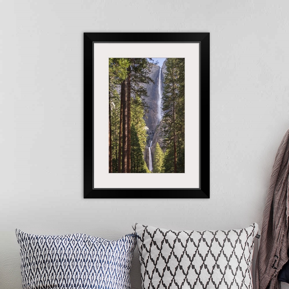 A bohemian room featuring Yosemite Falls through the conifer woodlands of Yosemite Valley, California, USA. Spring (June) 2...