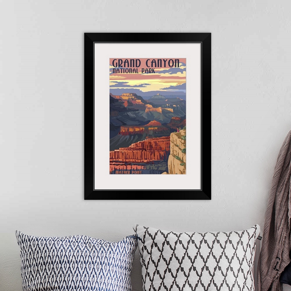 A bohemian room featuring Retro stylized art poster of a view of a massive canyon.