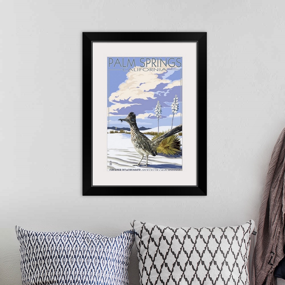 A bohemian room featuring Retro stylized art poster of roadrunner bird standing on white desert sands.