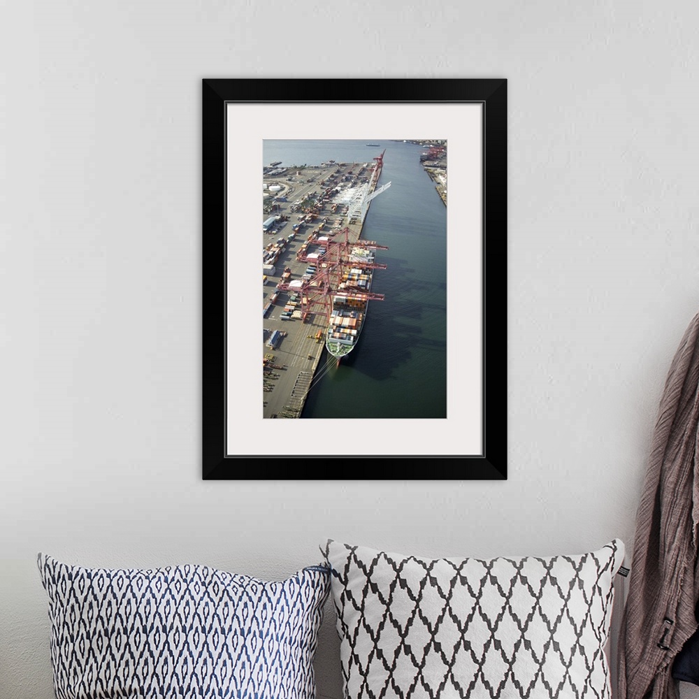 A bohemian room featuring Cranes loading a container ship at Port of Seattle, WA, USA - Aerial Photograph