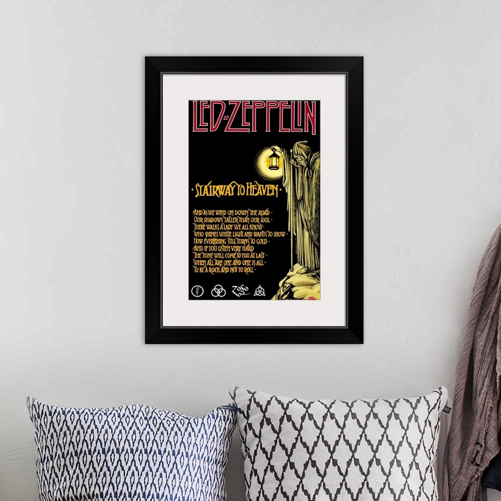 A bohemian room featuring Vintage poster of English rock band's song lyrics with grim reaper holding lantern and standing o...