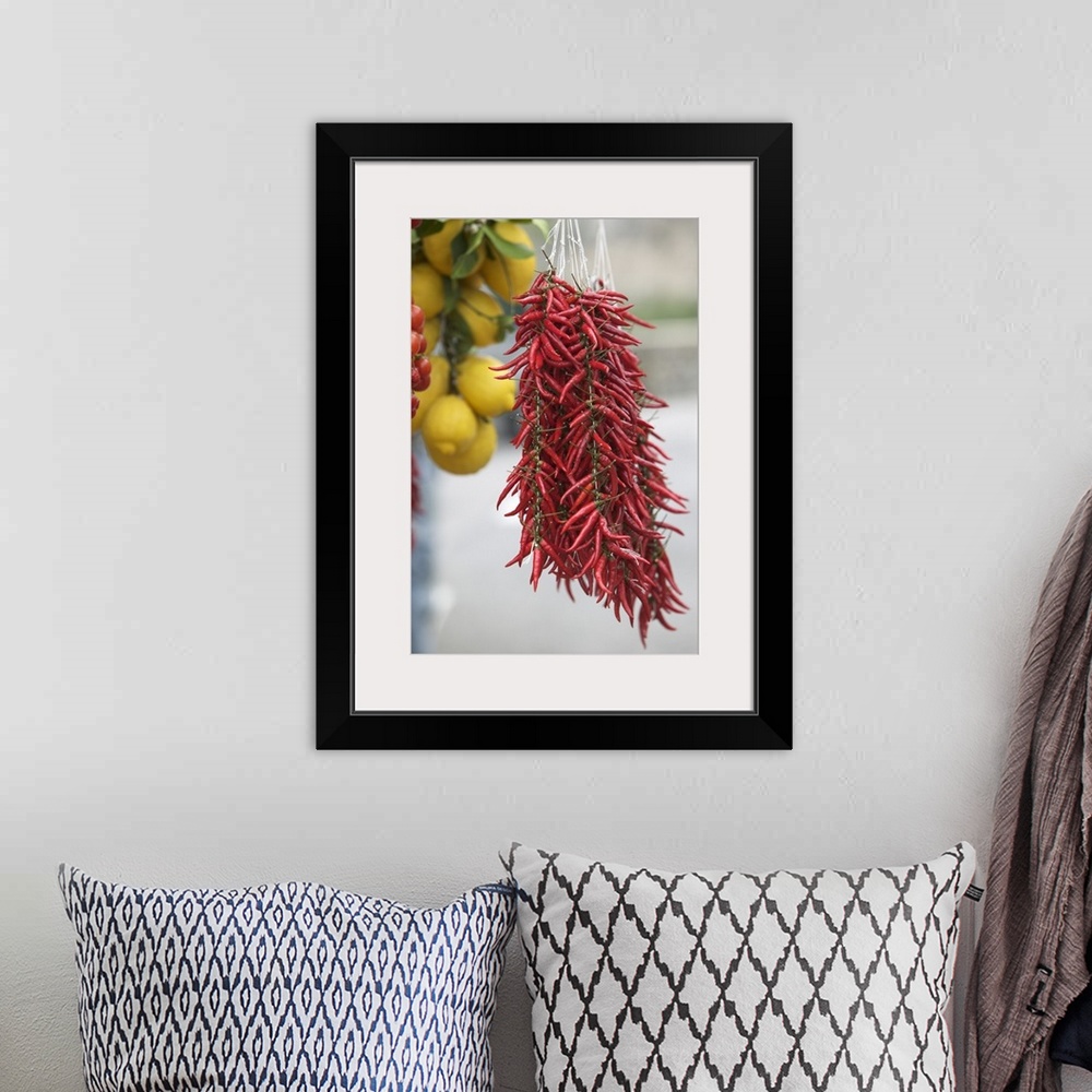 A bohemian room featuring Close-up of lemons and red chili peppers, Positano, Amalfi Coast, Campania, Italy