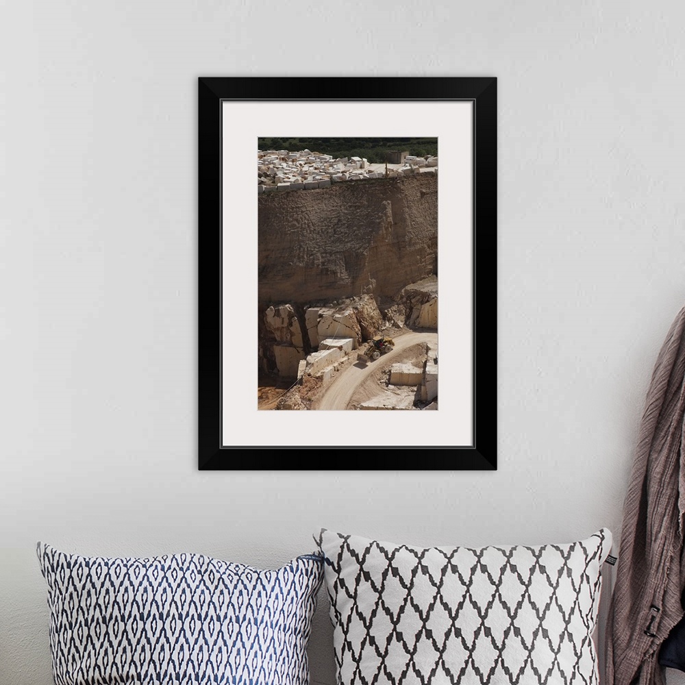 A bohemian room featuring Earth mover at a marble quarry, Orosei, Golfo di Orosei, Sardinia, Italy