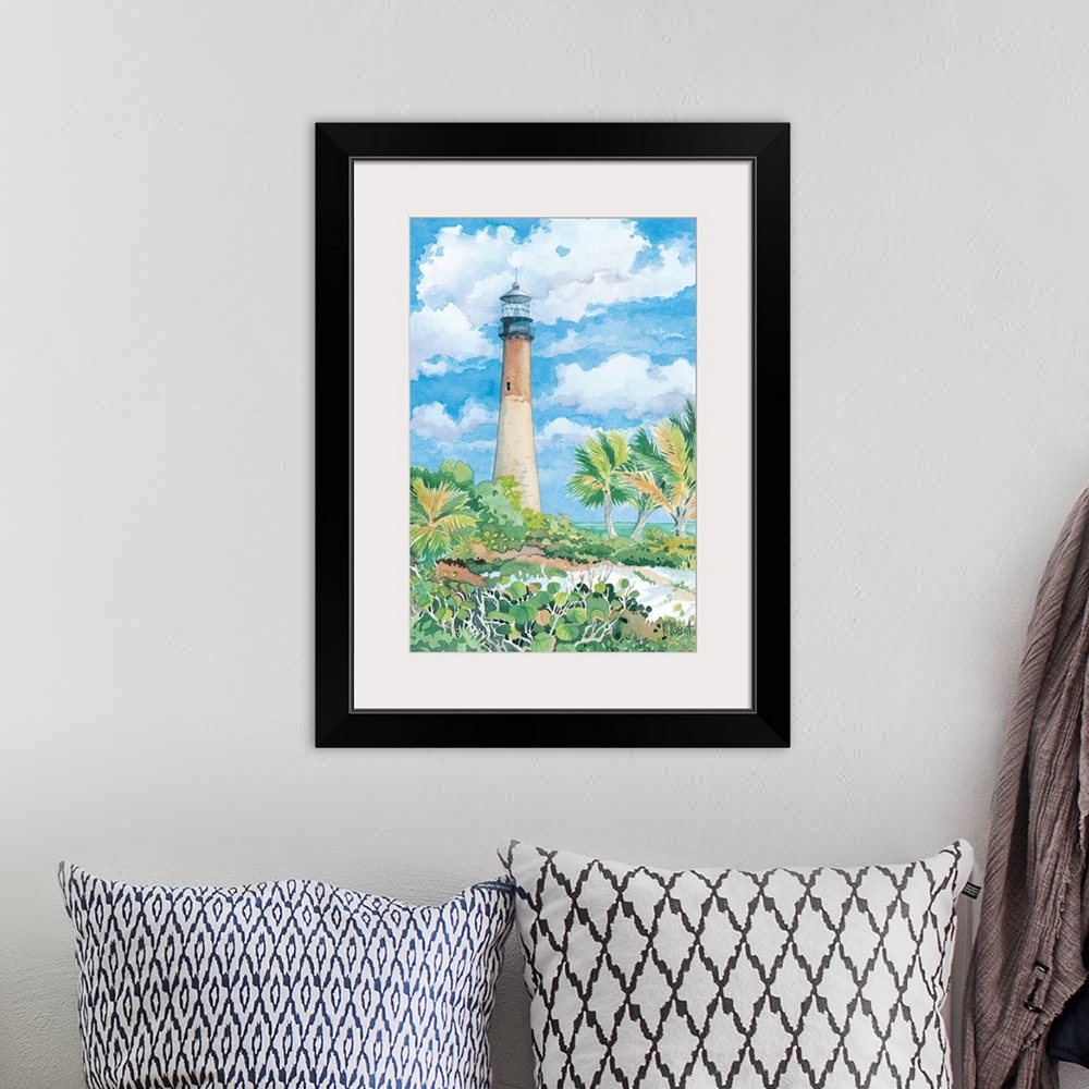 A bohemian room featuring Watercolor painting of a lighthouse against a cloudy sky on a tropical beach.