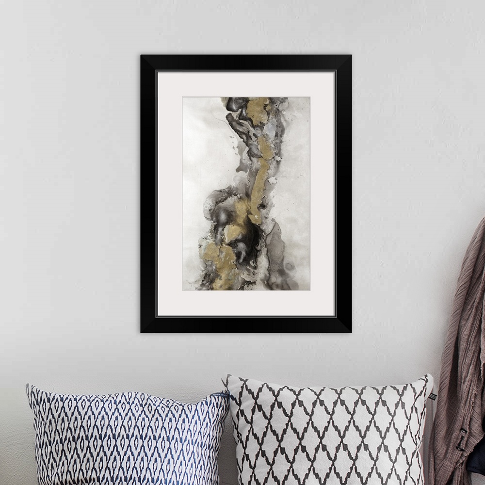 A bohemian room featuring Abstract painting of textured brush strokes with gold accents.
