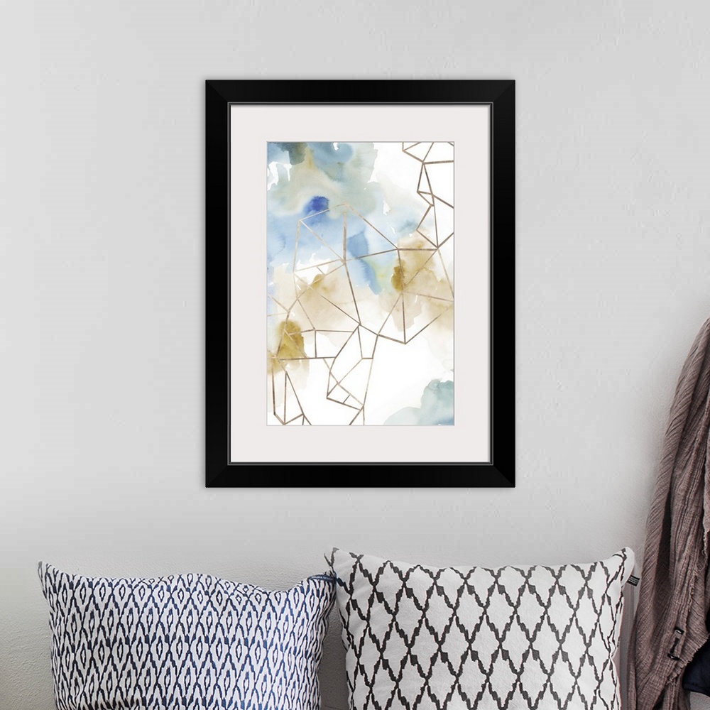 A bohemian room featuring Abstract watercolor painting of blue and brown with geometric gold lines.