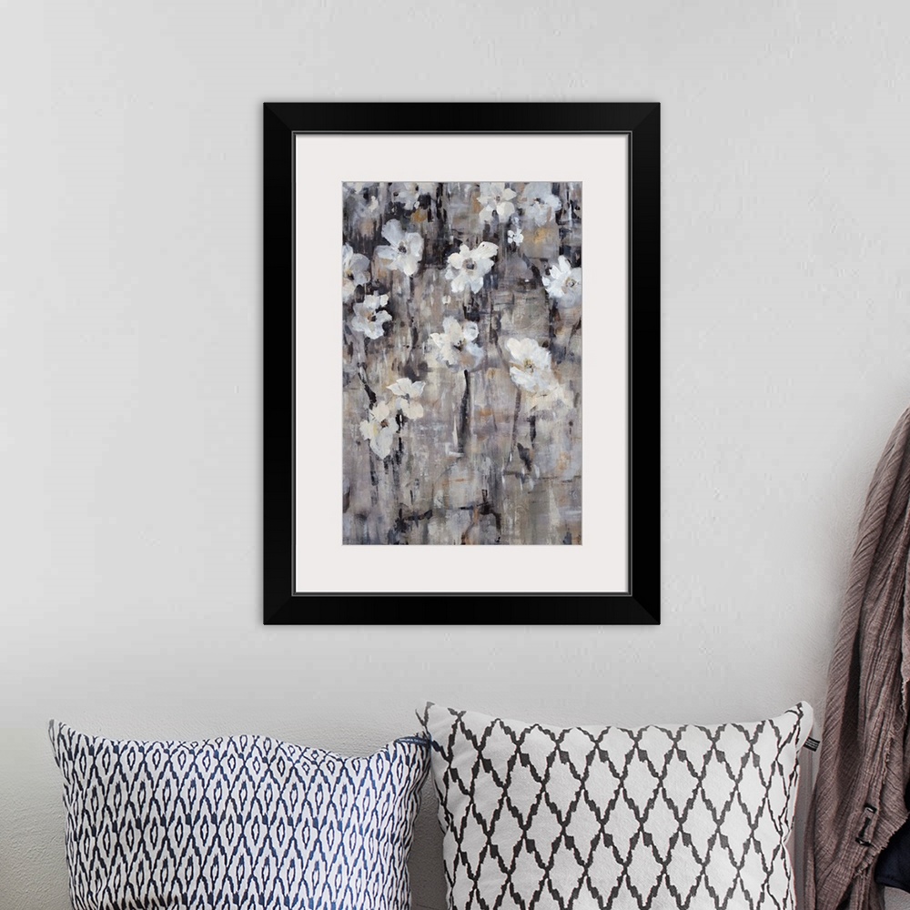 A bohemian room featuring Contemporary painting of gray-toned florals.