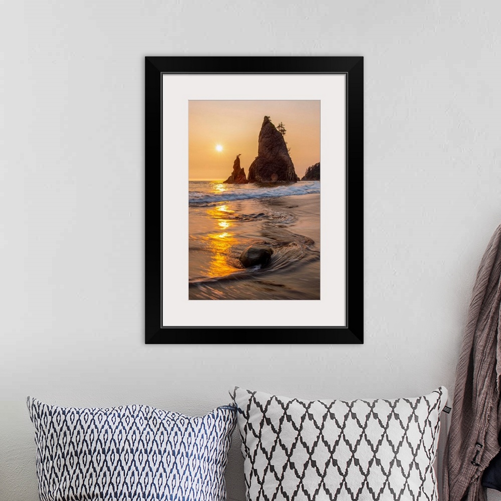 A bohemian room featuring Vertical columns of rock scatter beaches near Olympic National Park, Washington.
