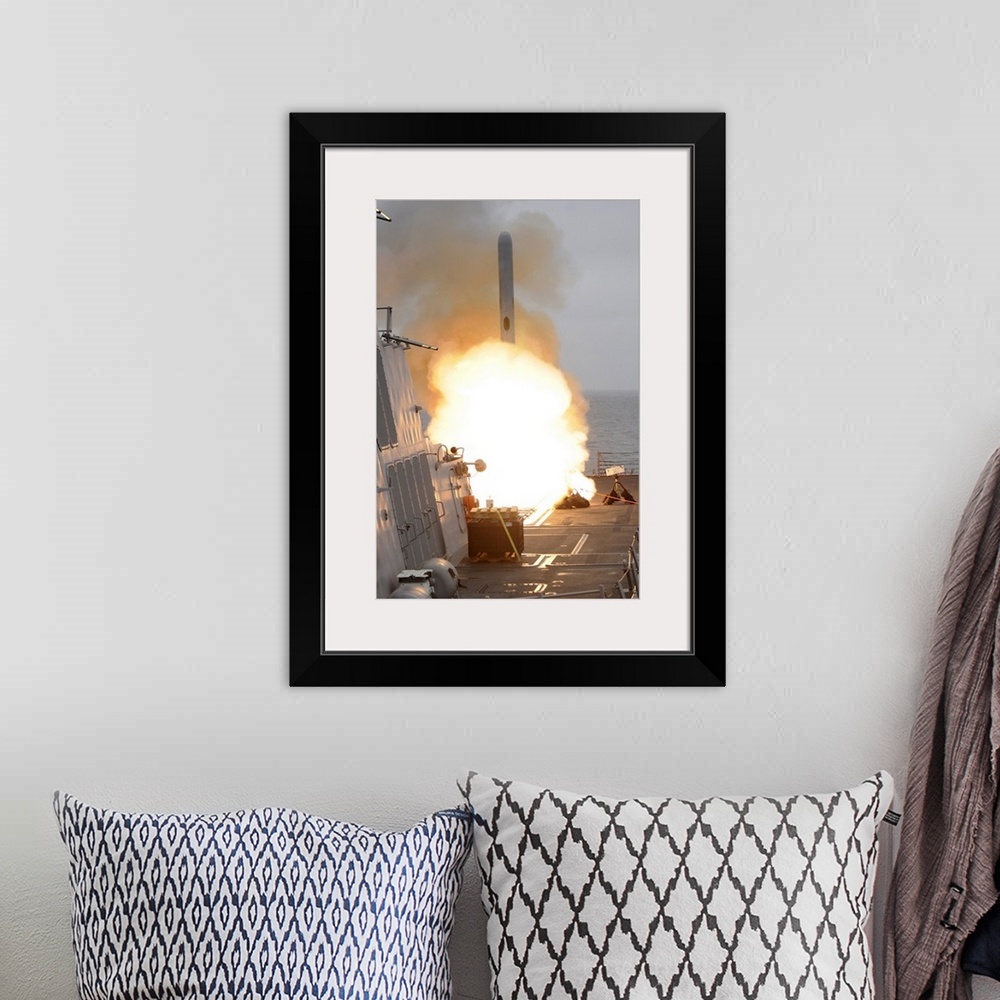 A bohemian room featuring San Diego, June 22, 2010 - A tomahawk missile launches off the aft vertical launching system aboa...