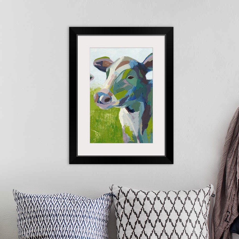 A bohemian room featuring Contemporary colorful painting of a cow in a field.