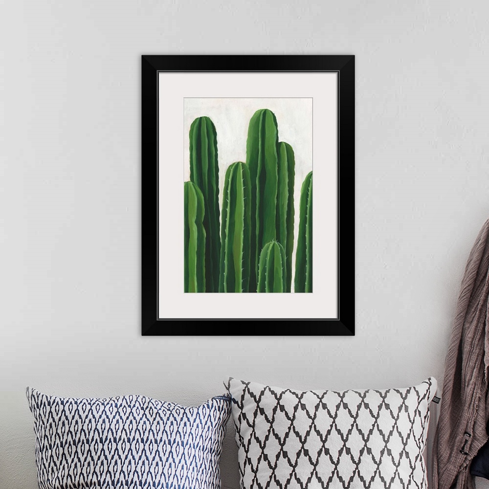 A bohemian room featuring Artwork featuring luscious cacti against a mottled background with gray and off-white brush strokes.