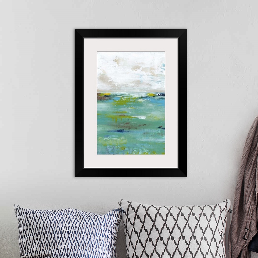 A bohemian room featuring Abstract painting resembling a body of water meeting the sky at the horizon.