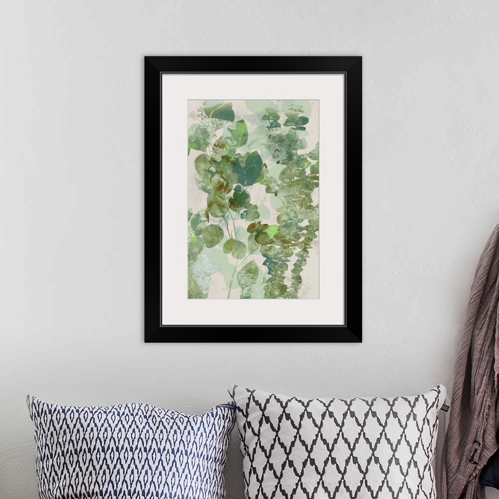 A bohemian room featuring Watercolor painting of green eucalyptus leaves.