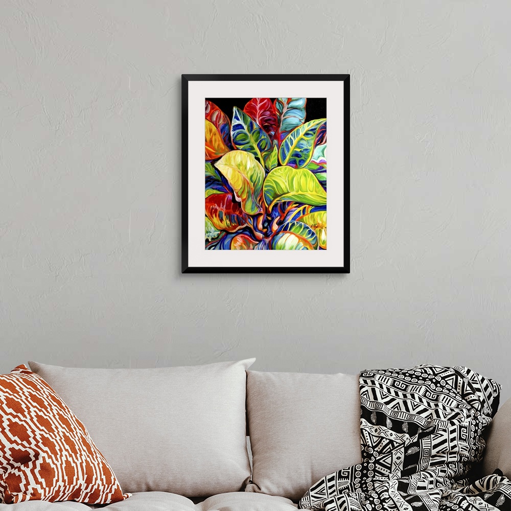 A bohemian room featuring Contemporary painting of colorful tropical leaves on a solid black background.