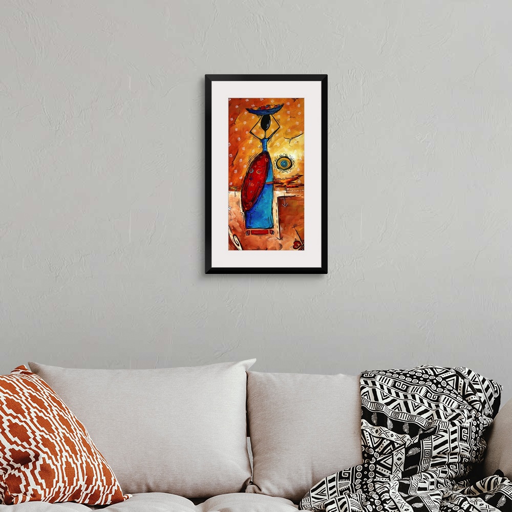 A bohemian room featuring Abstract artwork of an African woman holding a bowl of fruit on her head.