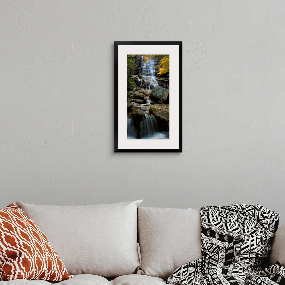 A bohemian room featuring Big photograph of Arethusa Falls that is located in Crawford Notch State Park in New Hampshire.  ...