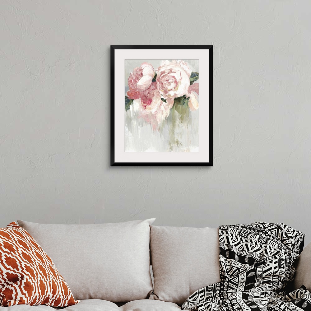 A bohemian room featuring Contemporary painting of pink peonies with white highlights and green leaves.