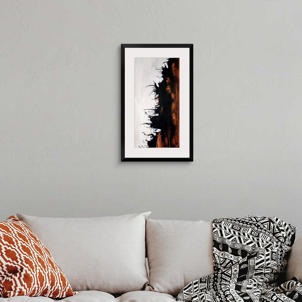A bohemian room featuring Vertical abstract painting of earth toned brushstrokes on the right with curved lines on the outs...