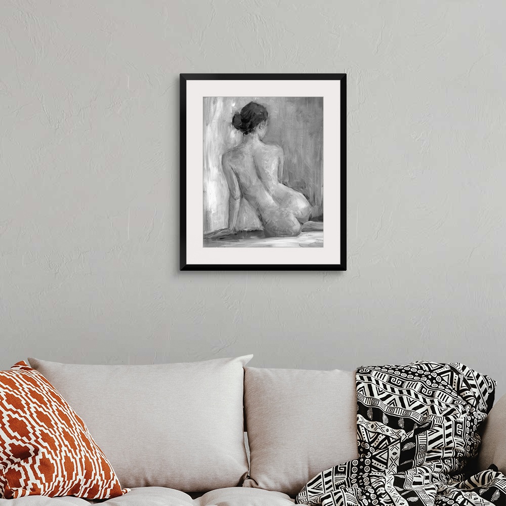 A bohemian room featuring Nude portrait of the back of a seated woman. Her back to the artist the lady stares off into the ...